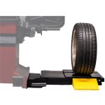 Coats 525 Wheel Lift with the focus on the tire.